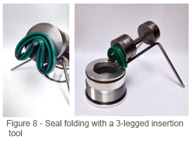 picture of seal folding with 3-legged insertion tool